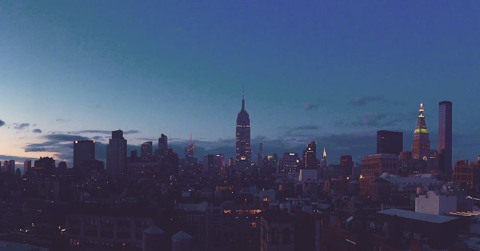 Captivating view of the New York City skyline at dusk featuring the iconic Empire State Building